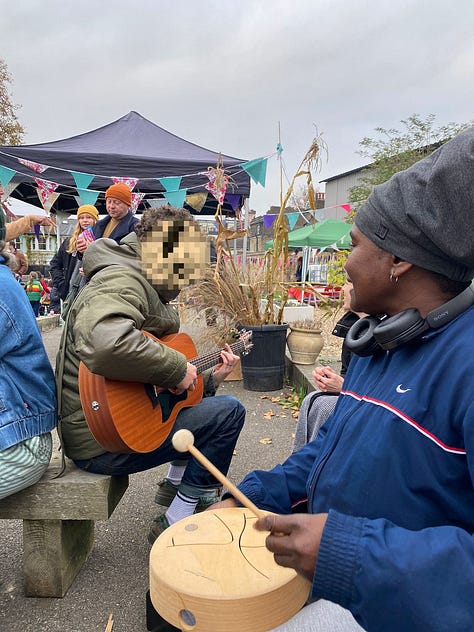 singing around the fire pit with various acoustic instruments, toasting marshmallows