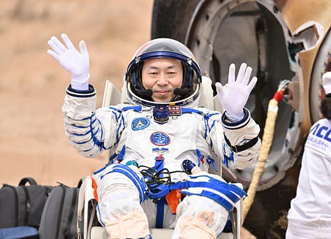 Wang Haoze (left), Song Lingdong (center), and Cai Xuzhe (right) after exiting the Shenzhou-19 spacecraft in the Inner Mongolia region.