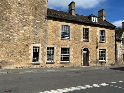 3 photos. One is the Lacock Road side of the Methuen Arms. The other two zoom in on the Post Office sign from c1800 and the chequer signs either side of the doorway. Images: Roland's Travels