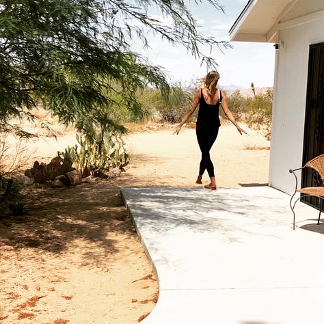 One row of three photos, left to right: Photo of barefoot woman walking away from a small white house, off a paved pathway and onto a sandy expanse, framed by pine trees and desert shrubs; cell phone mirror selfie of two women and a man, wearing face masks and coverings, in a living room; photo of a handwritten note on parchment paper, framed by white and brown owl feathers, laid on a dark wooden surface. Note reads: “Welcome Home Jennifer. May your Jackrabbit Journey be filled with love, creativity, healing, and abundance. <3 Allison.”