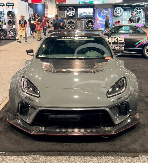 Variations of customized Toyota GR86 models seen at SEMA 2023 in Las Vegas.