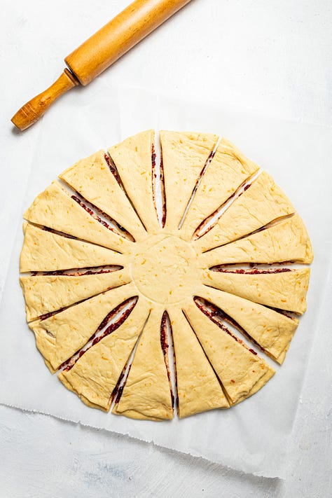 Making cranberry orange star bread.