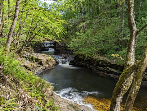 images of waterfalls in sunshine in the brecon beacons