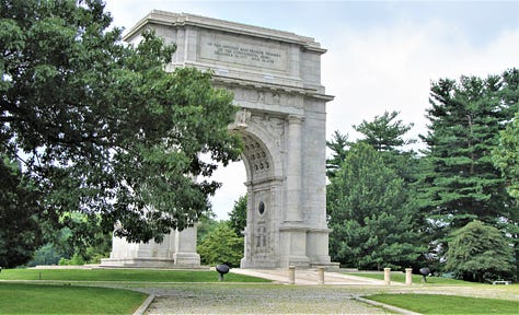 Pictures from Valley Forge Historic National Park in Valley Forge, Pa., including George Washington's headquarters, soldiers log huts, the Memorial Arch, the parade field, and a cannon next to an old tree.