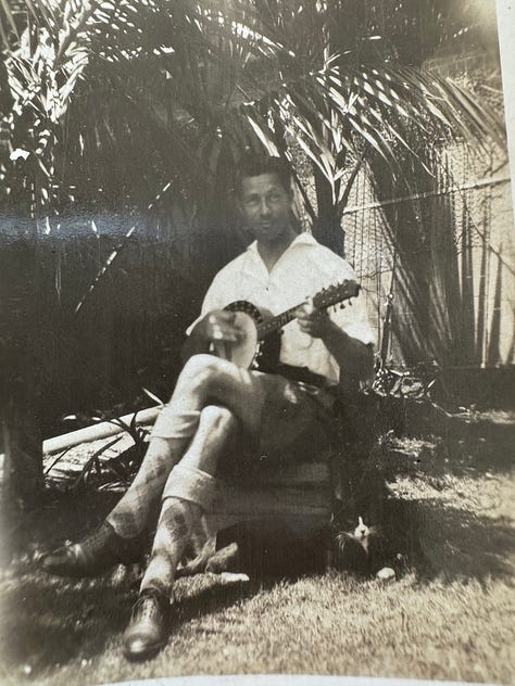 2 women in front of a liquor fridge, two women smiling bathed in pink light, two women smiling both with red lipstick on, notebooks on a table with the river in the background, jam and bowl of peaches, b&w photo of man playing the bango, b&w photo of woman smiling at a baby, two women smiling, two women smiling