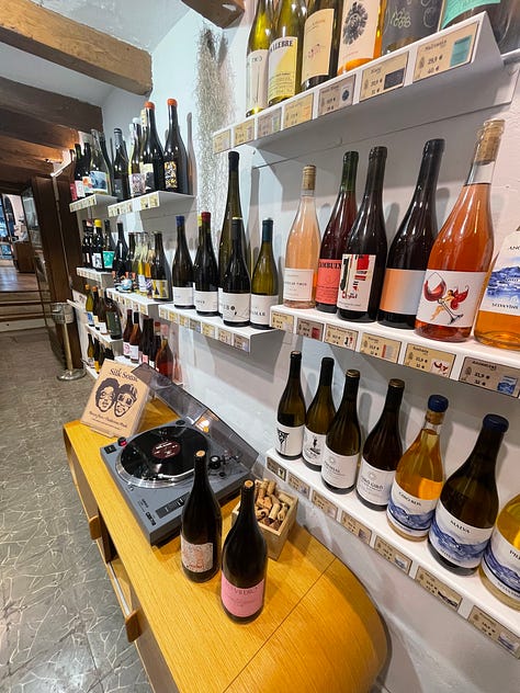 photos of la viniloteca, a natural wine and record shop in Palma, Mallorca, featuring natural wine and records