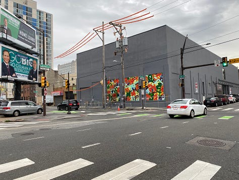 Series of nine photos depicting the evolution of my mural "Bound Together" located at 10th and Callowhill Streets in Philadelphia's Chinatown area. 