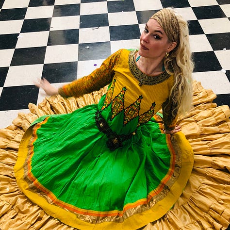 The author in a vivid green-and-gold dance gown poses on a black-and-white checkered floor, and frolics with her friends both inside and outside while decked as Harley Quinn.