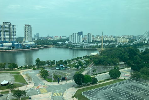 The outside of the Dorsett hotel; view of the Iron Mosque, view of bridge from 9th floor gym