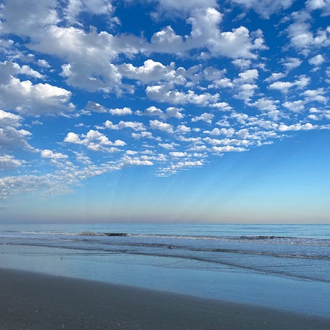 three views of ocean, sky and clouds at different times of day