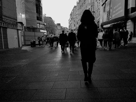 black and white and color images show life on the street