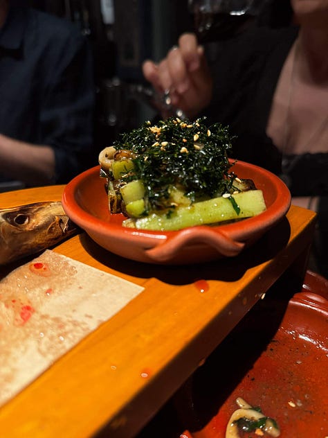 Potong's signature roasted duck with sides made of the duck, roasted duck brain and pickles.