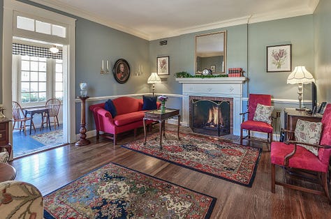 a wedding venue, seating near a fireplace, a cottage, a veranda, a bedroom