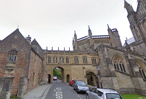 Passing the Cathedral Green in Wells into the portico onto St Andrew Street. You can see the famous Wells Clock to the right in the second photo. (More on that later this week!)  