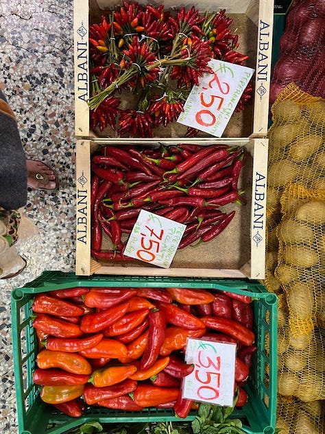 fruttivendolo in italy, all kinds of fresh fruits and vegetables of all colors of the rainbow