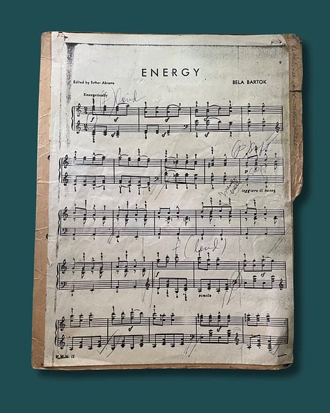 Photograph of the front and back of Stella's Grave IV Stamp Collection. Vintage stamps from early to mid-70s in the Philippines.A Xerox copy of a musical piece titled "Energy" by Bela Bartok is affixed on the opposite side from the stamps.