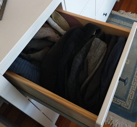 Shirs, hats, sweatshirts and yes, even underwear, arranged in color-coordinated rows in drawers and on hangers.