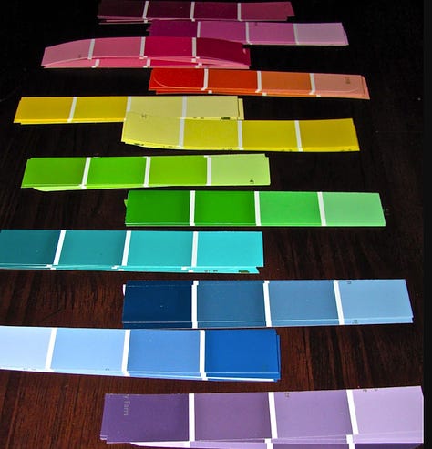 Photos of colored acrylic tiles, paint sample strips, and small multi-colored ceramic tiles.