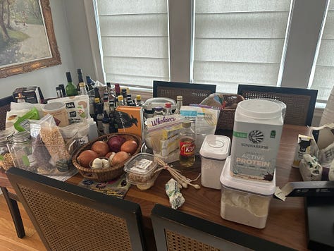 Clearing out the pantry; piles everywhere; the finished pantry