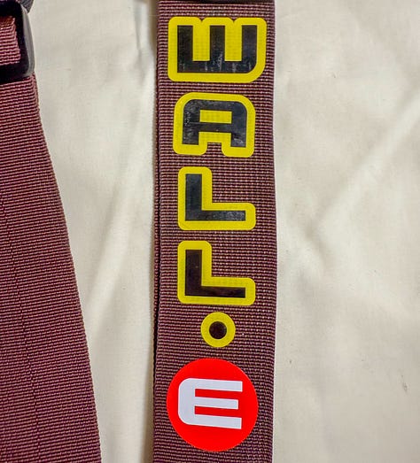 Brown tool harness with vinyl decals
