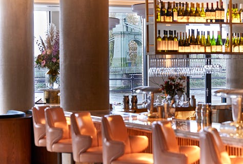 From left: Sam's Riverside Bar, seafood platter, and dining room