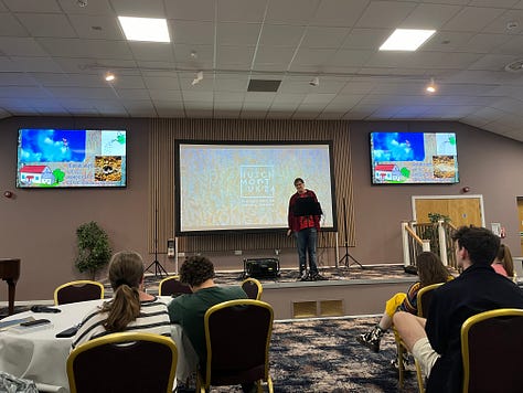 Andrew Peterson and other musicians playing - Esther Meek lecturing - the Northern Lights - Hayes Conference Centre in sunshine - printmaking workshop - selfie in front of Hutchmoot banner - Ruth Naomi Floyd singing - my copy of Every Moment Holy vol 3 with a print from it - Ted Turnau delivering the keynote