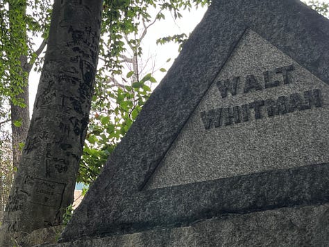 Images of Walt Whitman's final resting place: tomb, trees, plaque.