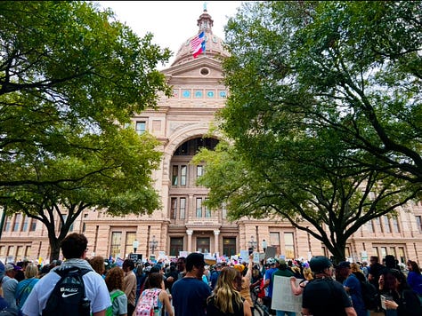 Photos showing crowds of protestors at the Austin, Texas state capitol on February 5. 2025