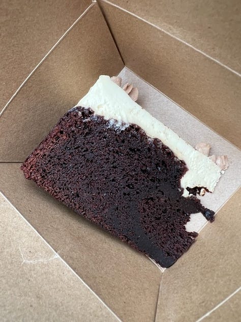 Chocolate Guinness Cake from Brunswick East, menu and box from vegan Ethiopian at Kaffa coffee in Dalston.