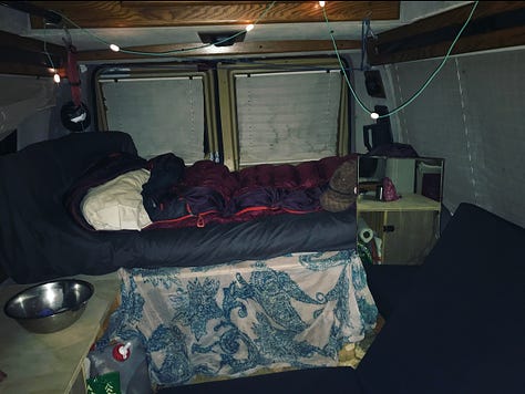 1. A gutted diy van. 2. The same van with a bed and sleeping bag and twinkle lights. 3. The same van years later with a kitchen and furniture. 4. Plants on a window ledge in a van. 5. Plants hanging from a van door. 6. A writing desk with notepad, notes, and an orange light inside a van.