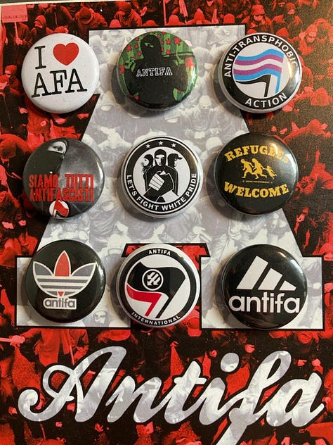 antifa buttons, a jacket that reads NAZI HUNTER, & a gentleman wearing a TOKYO AGAINST FASCISM shirt