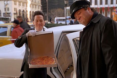 Macaulay Culkin in a Limo eating pizza and coke, with Rob Schneider in Home Alone and Home Alone 2: Lost in New York (1990 + 1992) | Film Flavor: A Newsletter Surveying Food in Film