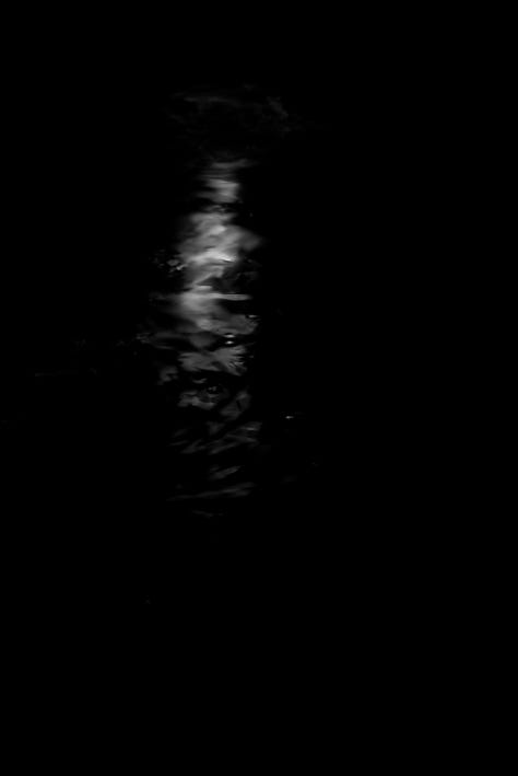Abstract Patterns created by the moonlight on the black waters. 