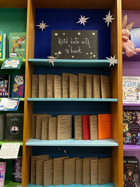 books, envelope, necklace