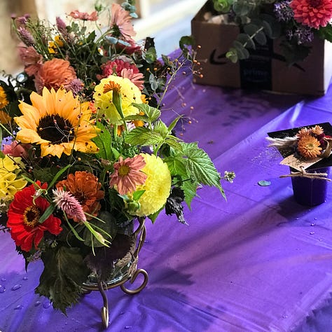 Images portray floral arrangements featuring dahlias, sunflowers, zinnias, and other blooms and foliage capturing the autumn season.