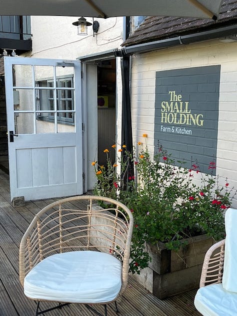 Nine images showing the outside seating area of The Small Holding with images of crops growing in the vegetable garden