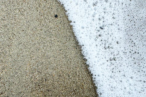 A series of three images show interesting beach views of sand, waves, pebbles, and bubbles.