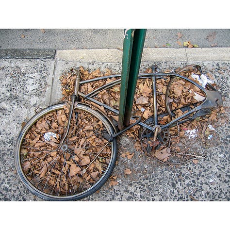 New York photos of abandoned bicycles on the street