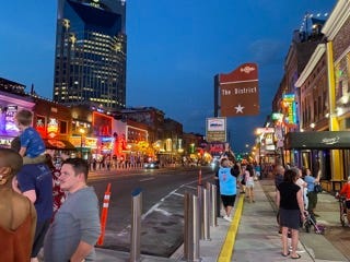 Various photos of Nashville’s tourist highlights, including its signature food “hot chicken,” Country Music HOF exhibits, and its replica of the Greek Parthenon.  