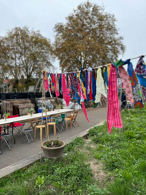 photos of ripe (bletted) medlars, the table setting, glassware and bunting decorations