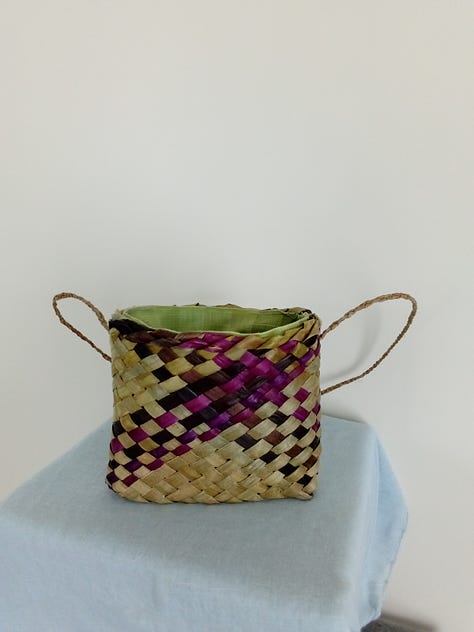 A selection of hand woven hand bags and shoulder bags