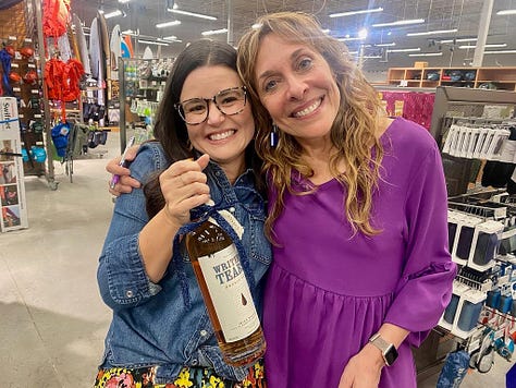 Woman signing book contract, two hands toasting, two women holding a bottle of writers tears