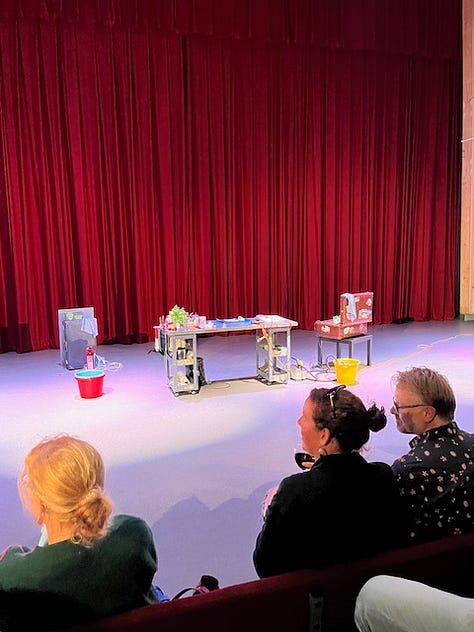 Several images of the comedy chef George Egg on stage in front of a red curtain and behind a table topped with ingredients and cooking tools