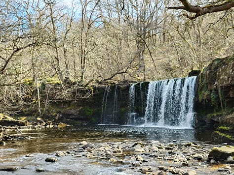 waterfalls of bannau brychieniog on a sunny day
