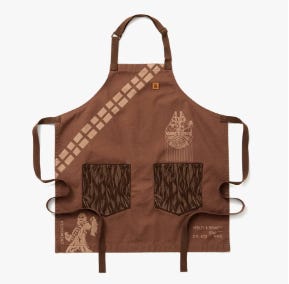 From left: kids knives, kids apron with flowers, kids apron with Chewbacca.