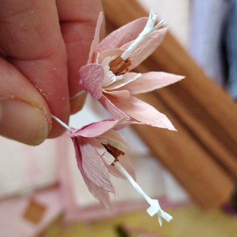 Close up images of the many little parts which make the oversized paper model of the heather 'Ling'