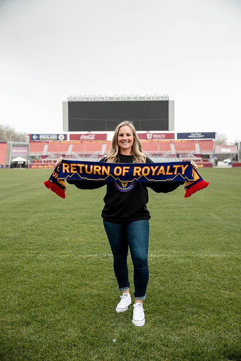 Amy Rodriguez poses for photos at America First Field upon being introduced as the new head coach of the relaunched Utah Royals FC. (Photo: Laura Dearden, Utah Royals FC)