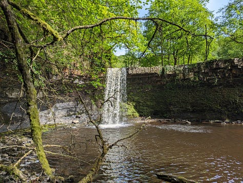 images of waterfalls in sunshine in the brecon beacons