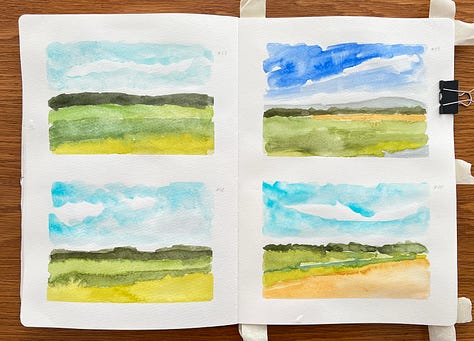 Watercolour landscapes in a sketchbook