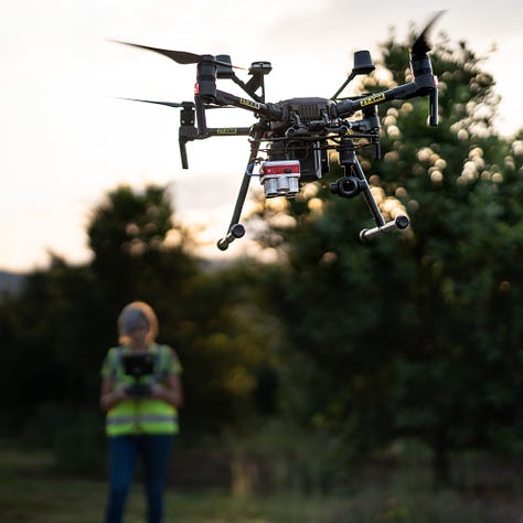 a DJI Matrice drone is setup and takes off ahead of a survey over macadamia trees in South Africa